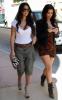 Kim Kardashian and Kourtney Kardashian seen shopping together on March 23rd 2010 in Miami Beach Florida 1