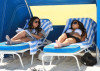 Kim Kardashian and Kourtney Kardashian spotted on March 30th 2010 as they film some scenes for their show Keeping Up with the Kardashians in bikinis on the beach 5