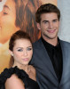 Liam Hemsworth and Miley Cyrus together at the premiere of The Last Song which was held on March 25th 2010 at ArcLight Hollywood in Los Angeles 6