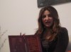 Iraqi singer Shatha Hassoun pictures as she receivs gifts from her own fan club 5