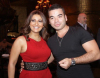 Iraqi singer Shatha Hassoun photo from her own birthday party wearing a stylish dark red dress 3