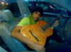 photo of Saudi student Sultan Bin Rashed with his guitar