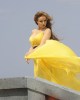 Rula Saed picture of April 12th 2010 while on the filming set of her new video clip Shayfak Oddami wearing a glam yellow dress 2