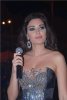 ciryne abdul noor singing live in a concernt while wearing a glam silver dress 7