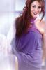 Egyptian Actress ghada abdul razzak photo shoot in a purple dress