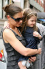 Katie Holmes and daughter Suri Cruise are spotted together on April 11th 2010 as they leave their New York City apartment building 4