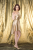 ghada abdul razzag new high quality studio photo shoot of April 2010 wearing a mini golden dress 3