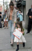 Suri Cruise walks with mom Katie Holmes while carrying a large US Postage envelope on April 8th 2010 in New York City 4