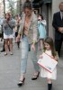 Suri Cruise walks with mom Katie Holmes while carrying a large US Postage envelope on April 8th 2010 in New York City 1