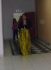 Miral faisal exclusive photo from her depature of star academy building in April 2010 wearing a stylish yellow dress 1