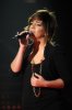 Miral zahreldin photo at the academy singing live on stage wearing a black dress