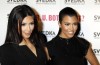 Kourtney Kardashian and her sister Kim at the Battle Of The Bots sponsored by Svedka Vodka held on May 23rd 2010 at Wonderland in Hollywood 3