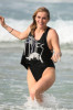 KeSha spotted on May 26th 2010 while at Bondi Beach with friends 5