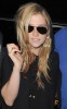 KeSha spotted on June 3rd 2010 as she leaves the central London Hotel accompanied by bodyguards 7