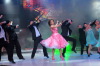 pictrure of the Star Academy 7 prime 16th finale while Hilda Khalife the show presenter on stage dancing with the dancers 1