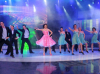 pictrure of the Star Academy 7 prime 16th finale while Hilda Khalife the show presenter on stage dancing with the dancers 5