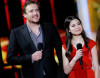 Jason Segel and Miranda Cosgrove speak onstage at the 2010 MTV Movie Awards held at the Gibson Amphitheatre on June 6th 2010 at Universal Studios in California 1