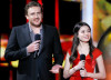 Jason Segel and Miranda Cosgrove speak onstage at the 2010 MTV Movie Awards held at the Gibson Amphitheatre on June 6th 2010 at Universal Studios in California 2