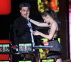 Robert Pattinson and Kristen Stewart on stage during the 2010 MTV Movie Awards held at the Gibson Amphitheatre on June 6th 2010 at Universal Studios in California 5