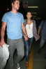 Miley Cyrus seen with her boyfriend Liam Hemsworth on june 16th 2010 as they arrive at LAX airport 1