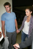 Miley Cyrus seen with her boyfriend Liam Hemsworth on june 16th 2010 as they arrive at LAX airport 5