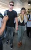 Miley Cyrus picture with her boyfriend Liam Hemsworth on June 18th 2010 while arriving at LaGuardia Airport in New York 1