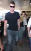 Miley Cyrus picture with her boyfriend Liam Hemsworth on June 18th 2010 while arriving at LaGuardia Airport in New York 3