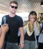 Miley Cyrus picture with her boyfriend Liam Hemsworth on June 18th 2010 while arriving at LaGuardia Airport in New York 4