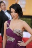 Kim Kardashian photo on January 30th 2011 at the red carpet of the 17th Annual SAGA Screen Actors Guild Awards wearing a long violet one shouldered dress dress 2