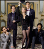 The Big Bang Theory poster of Sheldon, Leonard, Rajesh, Penny and  Wolowitz wearing formal black suits