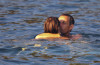 Carla Bruni seen with her husband the French President Nicolas Sarkozy on August 9th 2009 in the south of France while swimming in the beach 4