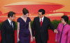 Carla Bruni Sarkozy and her husband President Nicolas Sarkozy during a welcome ceremony at the Opening of the World Expo on April 30th 2010 in Shanghai China 2