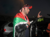 Mohamad Alqaq pictures as he reaches the Amman airport after he was eliminated from star academy 2