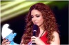 star academy fourth prime on April 22nd 2011 picture of Hilda Khalifeh as she gets a smurf from Houssam Taha