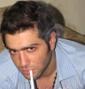 photos of Mohamad Al Qaq after he left star academy while smoking a cigarette