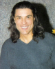 Osvaldo Rios photo shoot face closeup with long hair