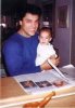 Osvaldo Rios personal photos with a baby 4