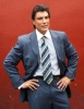 Osvaldo Rios photo shoot wearing a formal suit 2