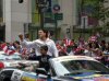 Osvaldo Rios spotted by photographers as he participates at a parade 1