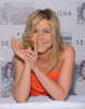 Jennifer Aniston wearing a strapless orange dress at the lauch of Jennifer Aniston perfume at Sephora Lexington Avenue on May 5th 2011 in New York City 1