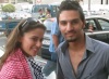 Layan Bazlamit picture on July 3rd 2011 as she arrives to Amman airport in Jordan with a fan