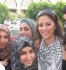 Layan Bazlamit picture on July 3rd 2011 as she arrives to Amman airport in Jordan with fans waiting for her at the airport entrance