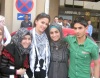 Layan Bazlamit picture on July 3rd 2011 as she arrives to Amman airport in Jordan with her fans waiting for her at the airport entrance