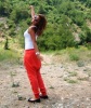 Newset photo of Nina Abdl Malak wearing red pants and a white top in June 2011 at a city in Lebanon after leaving star academy 12