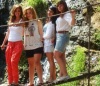 Newset photo of Nina Abdl Malak wearing red pants and a white top in June 2011 at a city in Lebanon after leaving star academy 13