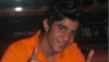 photo of the Kuwaiti student of star academy Abdul Salam after leaving star academy at the studio wearing an orange tshirt 1