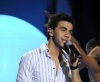 the 15th prime of staracademy8 on July 8th 2011 picture of Ahmad Ezzat from Egypt singing onstage