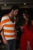 picture of Houssam Taha on July 15th 2011 after the final prime of star academy as he talks to Christine Saade